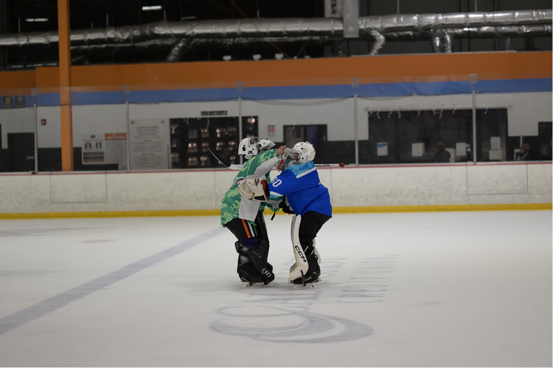 A goalie defending the net.