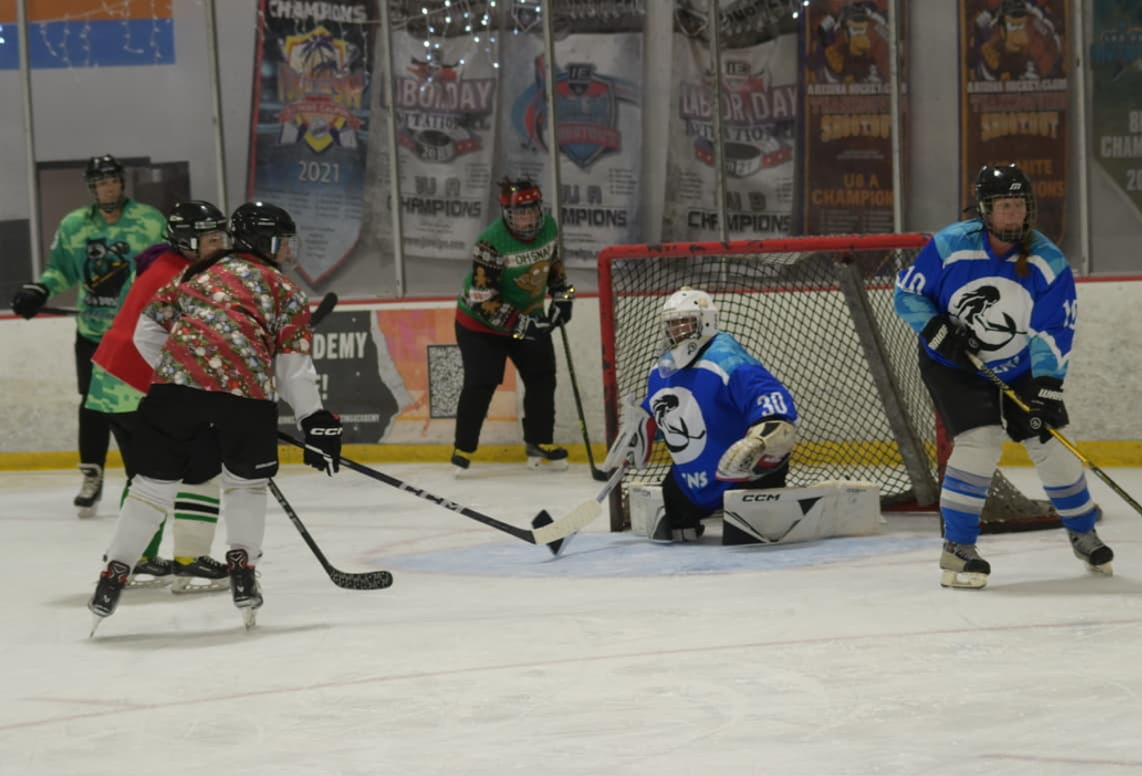A player taking a shot on goal.